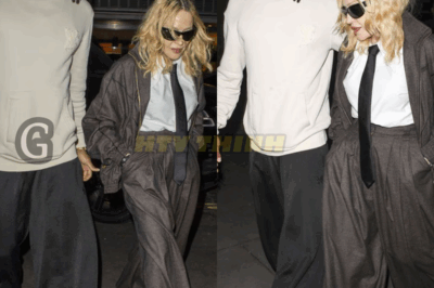 Madonna shines in a rooftop date night with boyfriend Akeem Morris. Is this just a romantic moment or is there a hidden mystery? Reactions and tensions are rising—you can’t miss this story!