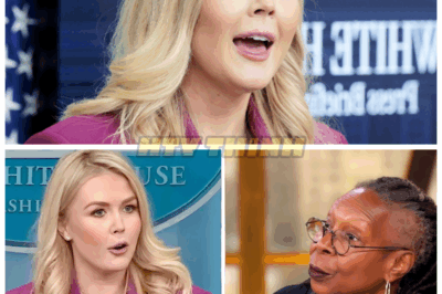 “Karoline’s CROSSFIRE: ‘Is That Cross Just for Show?’—Whoopi’s FAITH ATTACKED in Explosive TV Ambush 💣⛪😡” The line came out of nowhere—sharp, smirking, and utterly lethal: “Is that cross just for show?” Whoopi Goldberg blinked twice, then launched into a furious defense of her faith live on-air. But it was too late. Karoline Leavitt had already lit the match. Now co-hosts are being accused of enabling a takedown, and fans are rioting across both political lines in an unholy battle of beliefs and shade.👇