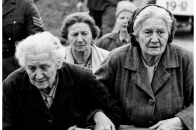 German POW Grandmothers Were Left to Die — U.S. Soldiers Carried Them 12 Miles to Medical Care Bavaria, April 1945. The road stretched through pine forest and morning mist. 12 mi of muddy track between a makeshift prisoner camp and the nearest field hospital with adequate supplies. Three elderly German women lay on crude stretchers fashioned from blankets and tree branches, their breathing shallow, their bodies failing from pneumonia and exhaustion, and the accumulated weight of years spent surviving a war that had consumed their sons and grandsons. The American medics who found them boys from Iowa and Tennessee who had fought across Europe faced a choice. leave these enemy civilians to die as their own forces had abandoned them or carry them through mountain terrain to care they desperately needed. What they chose and why would challenge everything both sides had been taught about enemies and worth and the obligations…………