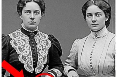 This 1901 Portrait of Two Sisters Looks Harmless — Until You See What One Is Holding  This 1901 portrait of two sisters looks harmless until you see what one is holding.  Dr.Michael Hayes had seen the thousands of photographs in his 20-year career as a Civil War era historian, but something about this particular portrait stopped him cold.  It was a humid Tuesday afternoon in August 2018 when he first encountered the image at a Charleston estate sale.  The photograph showed two young women in their 20s seated side by side in an elegant parlor, their Victorian dresses immaculate, their expressions serene.  The handwritten inscription on the back read simply, “Catherine and Ellaner, March 1901.  ” Michael almost passed it by.  Another formal portrait from the turn of the century, destined for some collector’s drawer.  But there was something in the older sister’s eyes.  Catherine, he assumed, that held a quality he couldn’t quite name.  Not fear, exactly.  Something deeper, something that made his historian’s instinct pulse with recognition.