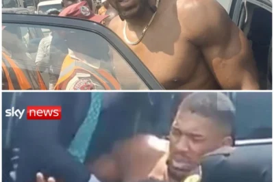 “Anthony Joshua’s SHOCKING Car Crash in Nigeria: Was It Just Bad Luck or Something More Sinister?” In a jaw-dropping twist that no one saw coming, Anthony Joshua, the former heavyweight champion, has been injured in a car crash in Nigeria. The details surrounding the accident are still murky, and police reports are offering few answers. What exactly happened? Was Joshua the victim of a freak accident, or is there something darker lurking behind this incident? As fans and officials scramble to get answers, the question on everyone’s mind is: will this crash derail Joshua’s career, or is this just a momentary setback for the boxing legend? One thing’s for sure—the answers to this mystery could shock the world. 👇